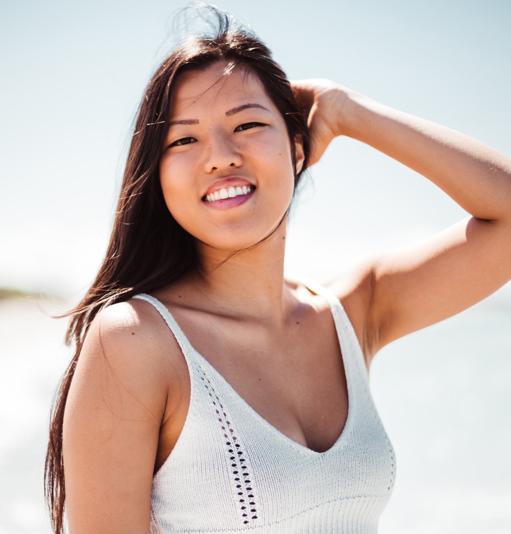 a woman in a swimsuit posing for a picture